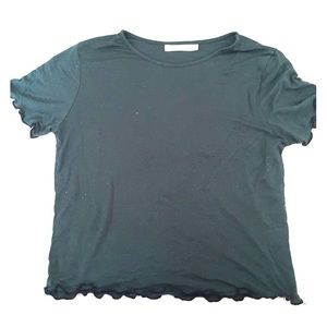 Dark green lettuce crop shirt.